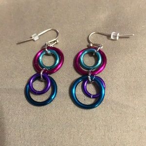 Two-tier dangling earrings. In multiple colors.